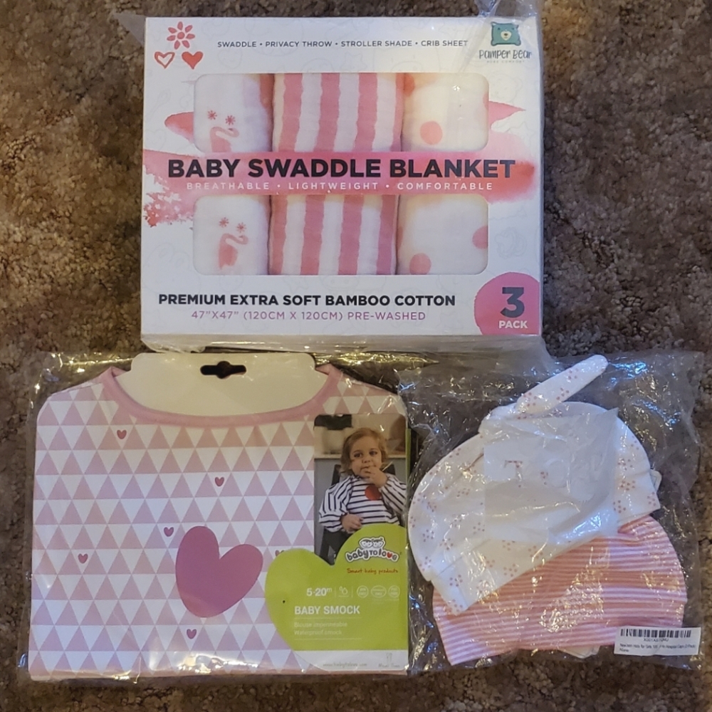 Baby smock, swaddle blanket and beanies bundle